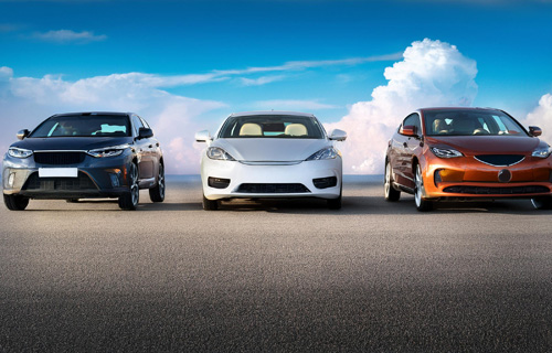 three difference cars lined up